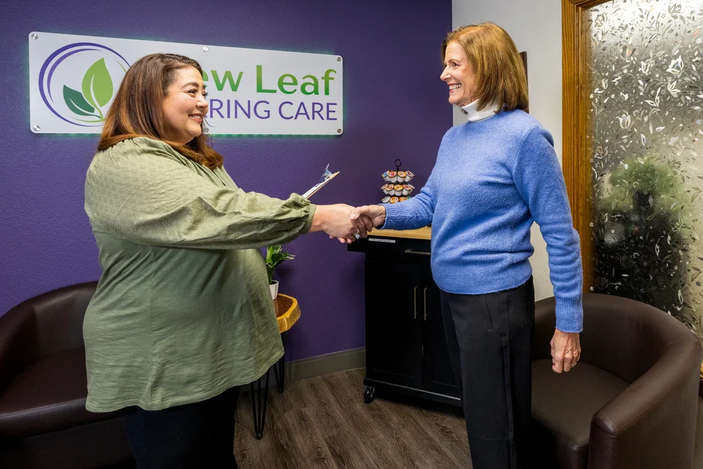Hearing care provider welcoming a patient at New Leaf Hearing Care